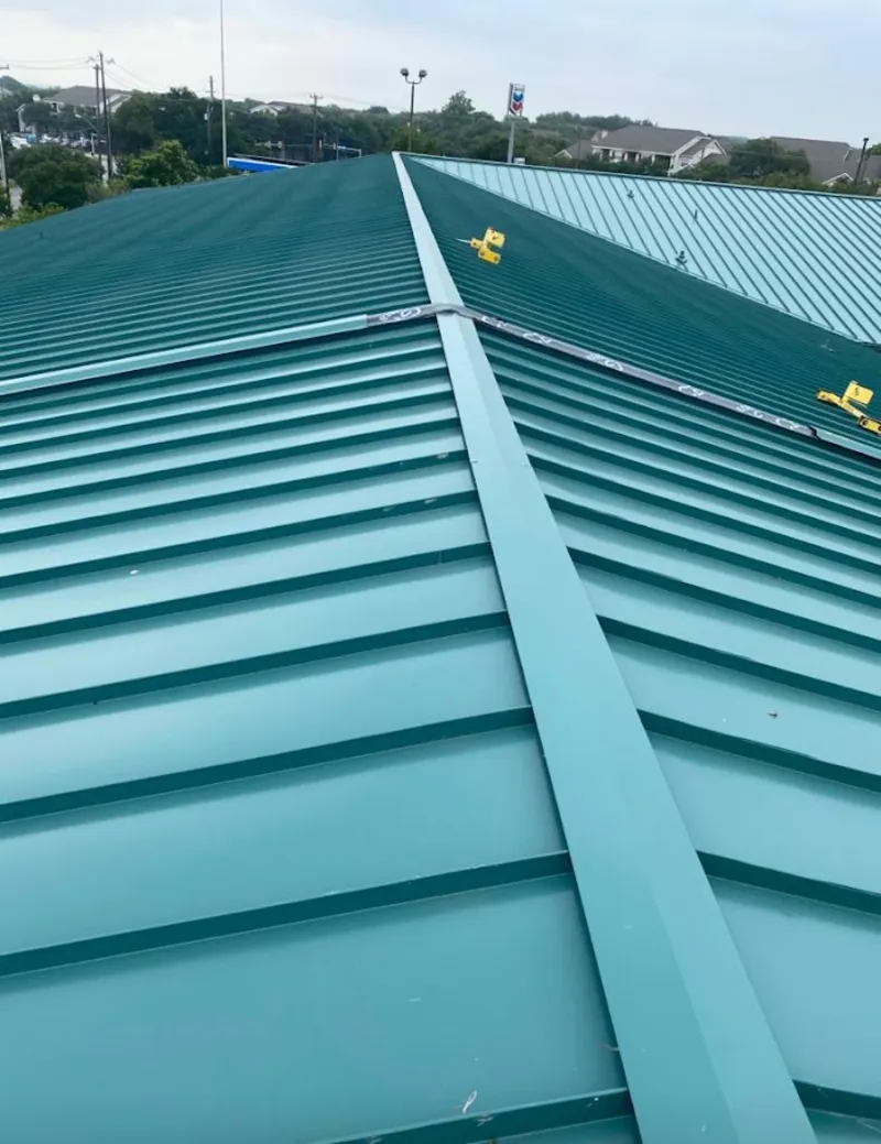 Green commercial metal roof ridge and valley for Metal Roof Repair in Amelia